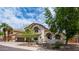 Beautiful home with mature landscaping and a driveway at 3166 E Desert Willow Rd, Phoenix, AZ 85048