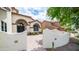 Charming home with a front entry wall and unique desert landscaping at 3166 E Desert Willow Rd, Phoenix, AZ 85048