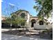 Charming two-story home featuring a desert landscaped front yard and a welcoming entrance at 3166 E Desert Willow Rd, Phoenix, AZ 85048