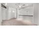 Cozy upstairs loft area with carpet, a ceiling fan, and natural light provides a flexible living space at 3166 E Desert Willow Rd, Phoenix, AZ 85048