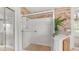 Shower featuring glass doors, a tiled floor, and ample space for a luxurious experience at 3166 E Desert Willow Rd, Phoenix, AZ 85048