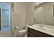 Neat bathroom features a well-lit vanity area, toilet, and shower-tub combination at 3319 W Carter Rd, Phoenix, AZ 85041