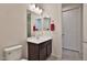 Clean bathroom featuring modern vanity, mirror, and fixtures with tile flooring at 3319 W Carter Rd, Phoenix, AZ 85041