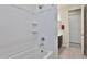 Clean bathroom showcasing a bathtub and shower combination featuring white tiling and modern fixtures at 3319 W Carter Rd, Phoenix, AZ 85041