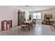 Cozy dining room with a wooden table, chairs, and a hutch at 3319 W Carter Rd, Phoenix, AZ 85041