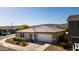 Charming home with a desert-landscaped front yard, a two-car garage, and beautiful mountain views at 3319 W Carter Rd, Phoenix, AZ 85041