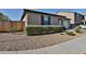 Well-maintained single-story home featuring low maintenance desert landscaping with neutral tones at 3319 W Carter Rd, Phoenix, AZ 85041