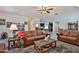 Open floor plan with tile flooring, comfortable furniture, and natural light at 3319 W Carter Rd, Phoenix, AZ 85041