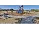 Vibrant playground equipped with diverse play structures, promoting physical activity and social interaction at 3319 W Carter Rd, Phoenix, AZ 85041