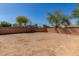 Backyard view with block wall and desert landscaping potential at 3532 S 160Th Ln, Goodyear, AZ 85338