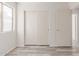 Neutral bedroom features sliding door closet, wood-look flooring and a window at 3532 S 160Th Ln, Goodyear, AZ 85338