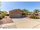 A well maintained single-Gathering home featuring a two-car garage and desert landscaping at 3532 S 160Th Ln, Goodyear, AZ 85338