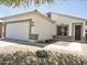 Well-maintained single-story home boasts desert landscaping, a two-car garage and decorative stone accents at 365 E Mountain View Rd, San Tan Valley, AZ 85143