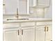 Modern kitchen sink featuring a stainless steel faucet and white countertops that exude clean and modern style at 365 E Mountain View Rd, San Tan Valley, AZ 85143
