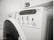 Close-up of a modern laundry machine featuring timed cycles and various wash settings for optimal garment care at 365 E Mountain View Rd, San Tan Valley, AZ 85143