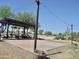 Outdoor covered seating area with patio and landscaping overlooking the Arizona scenery at 365 E Mountain View Rd, San Tan Valley, AZ 85143