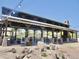 Spacious outdoor pavilion with picnic tables, offering a great space for community events and gatherings at 365 E Mountain View Rd, San Tan Valley, AZ 85143