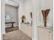 Hallway with decorative shelving and cabinets with designer details and modern decor at 37308 N 100Th Pl, Scottsdale, AZ 85262
