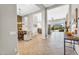 Spacious open-concept living area with tile floors and lots of natural light at 37308 N 100Th Pl, Scottsdale, AZ 85262