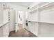 Bright walk-in closet with custom storage solutions and tile flooring offers easy access to other rooms at 37308 N 100Th Pl, Scottsdale, AZ 85262