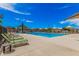 Relaxing community pool featuring lounge chairs, shaded umbrellas, and crystal-clear water for a refreshing swim at 3907 E Archer Dr, San Tan Valley, AZ 85140