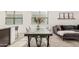 Bright dining area with a modern table setting and large windows at 3907 E Archer Dr, San Tan Valley, AZ 85140