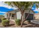 Well-kept front yard with drought-resistant landscaping, leading to a charming single-story home with a two-car garage at 3907 E Archer Dr, San Tan Valley, AZ 85140