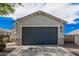 Attached two car garage featuring stone veneer accents at 3907 E Archer Dr, San Tan Valley, AZ 85140