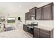 Well-equipped kitchen featuring stainless steel appliances and granite countertops at 3907 E Archer Dr, San Tan Valley, AZ 85140