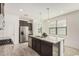 Open kitchen with stainless steel appliances and a spacious center island at 3907 E Archer Dr, San Tan Valley, AZ 85140