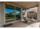 This patio offers a relaxing outdoor space with comfortable seating and clear views of the backyard at 3907 E Archer Dr, San Tan Valley, AZ 85140