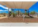 Inviting playground with slides and climbing structure under a shaded canopy at 3907 E Archer Dr, San Tan Valley, AZ 85140
