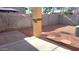 Backyard with gravel, a block wall, pavers, and AC unit at 4056 E Devon Dr, Gilbert, AZ 85296