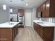 Modern kitchen with stainless steel appliances, granite countertops, and lots of cabinet space at 4056 E Devon Dr, Gilbert, AZ 85296
