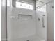 Modern bathroom featuring a new shower with a gray shower and a tiled niche at 40741 N Citrus Canyon Trl, Anthem, AZ 85086