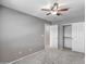 Neutral bedroom featuring carpet, ceiling fan, and closet at 40741 N Citrus Canyon Trl, Anthem, AZ 85086