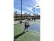 Active pickleball court with players in motion, highlighting community recreation and fitness at 40741 N Citrus Canyon Trl, Anthem, AZ 85086