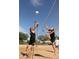 Outdoor volleyball court on a sunny day, perfect for recreational activities and enjoying the outdoors at 40741 N Citrus Canyon Trl, Anthem, AZ 85086