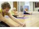 Indoor yoga class provides a serene environment for relaxation and stretching at 40741 N Citrus Canyon Trl, Anthem, AZ 85086