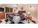 Cozy bedroom featuring a large bed, wooden furniture, and unique decorative items at 4218 S 46Th Pl, Phoenix, AZ 85040