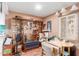 Versatile bonus room featuring built-in shelving and an abundance of natural light at 4218 S 46Th Pl, Phoenix, AZ 85040