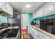 Functional kitchen featuring stainless steel appliances, and ample counter space at 4218 S 46Th Pl, Phoenix, AZ 85040