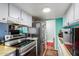Functional kitchen featuring stainless steel appliances, and ample counter space at 4218 S 46Th Pl, Phoenix, AZ 85040