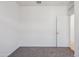 A bright bedroom features neutral carpet and a window at 5094 E Umber Rd, San Tan Valley, AZ 85143