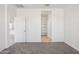 Carpeted bedroom featuring view of a pantry at 5094 E Umber Rd, San Tan Valley, AZ 85143