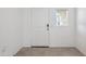 Bright entryway featuring white door, small window and neutral tile flooring at 5094 E Umber Rd, San Tan Valley, AZ 85143