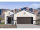 Inviting single-story home featuring neutral colors, stylish accents, and beautiful mountain backdrop at 5094 E Umber Rd, San Tan Valley, AZ 85143