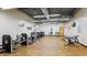 Community gym with weight machines, benches, and open space, offering a variety of workout options at 5094 E Umber Rd, San Tan Valley, AZ 85143