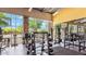 Community gym featuring stone accents, large windows, and an array of weight training equipment at 5094 E Umber Rd, San Tan Valley, AZ 85143