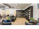 Lounge with a library, comfortable seating, and a kitchenette offering a relaxing retreat at 5094 E Umber Rd, San Tan Valley, AZ 85143